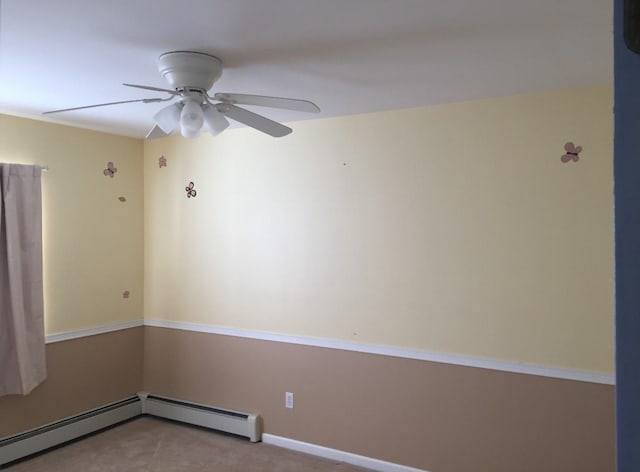 unfurnished room featuring ceiling fan, light carpet, and a baseboard heating unit