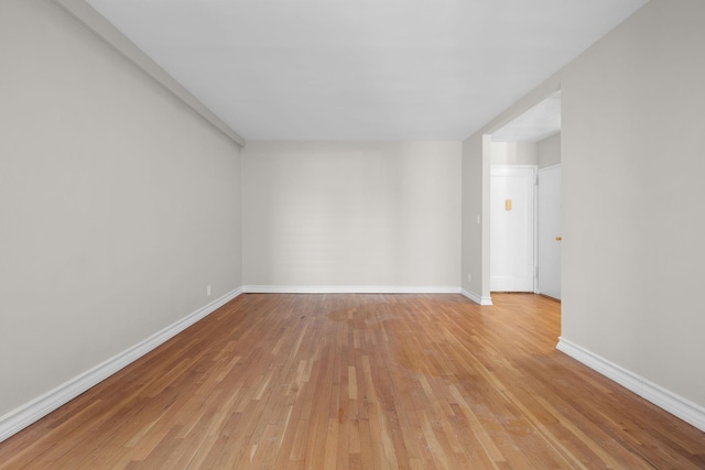 unfurnished room featuring light hardwood / wood-style flooring