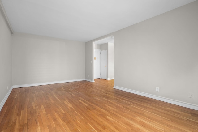 unfurnished room featuring light hardwood / wood-style floors