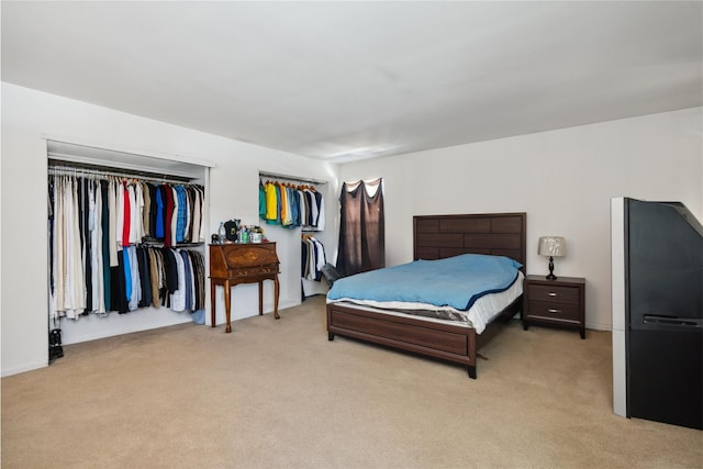 bedroom with light carpet