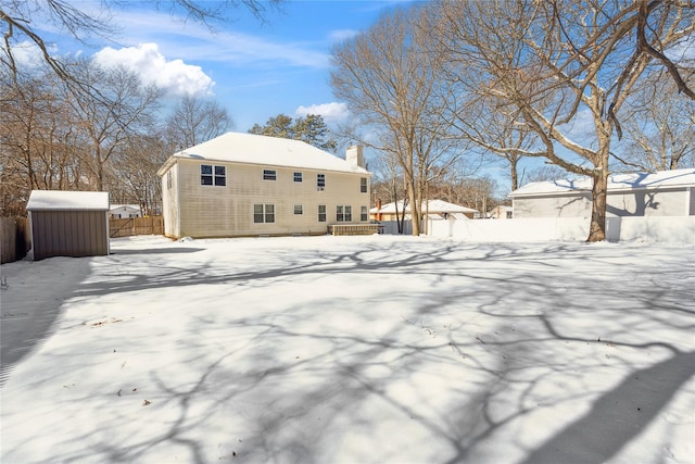 view of snow covered property