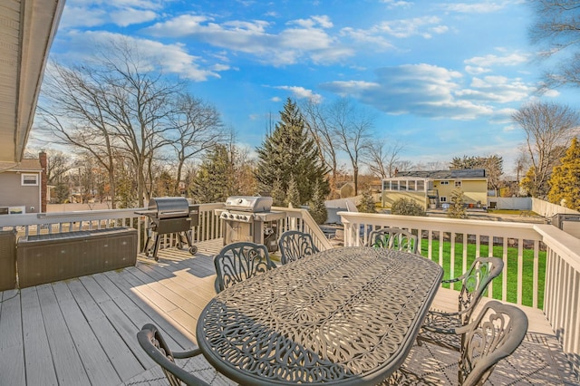 wooden terrace with grilling area