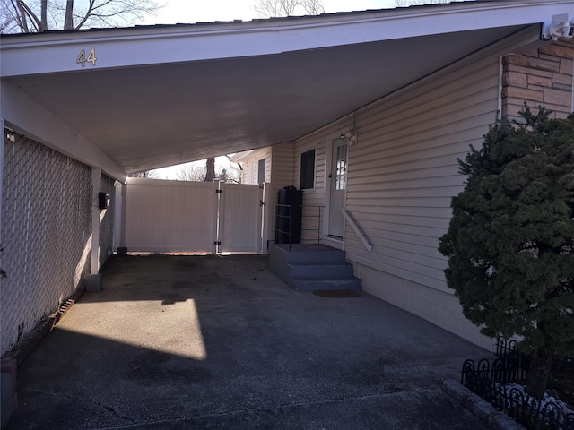 view of parking featuring a carport