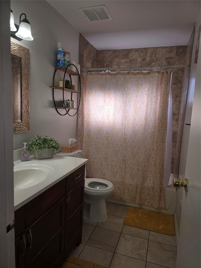 full bathroom featuring vanity, shower / bath combination with curtain, tile patterned floors, and toilet