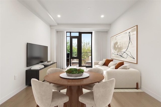 dining area with light hardwood / wood-style flooring