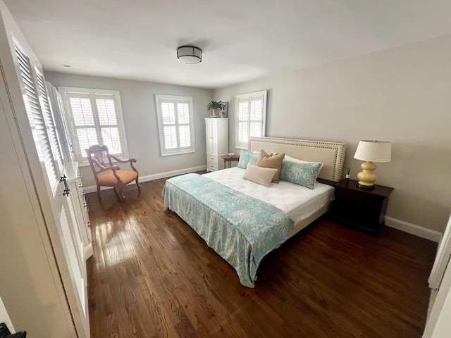 bedroom featuring dark wood-type flooring