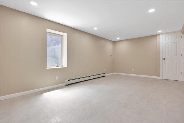 unfurnished room featuring a baseboard radiator