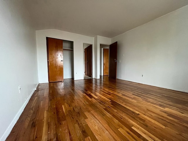 unfurnished bedroom with wood-type flooring