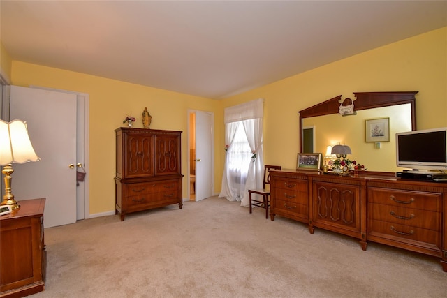 living area with light colored carpet