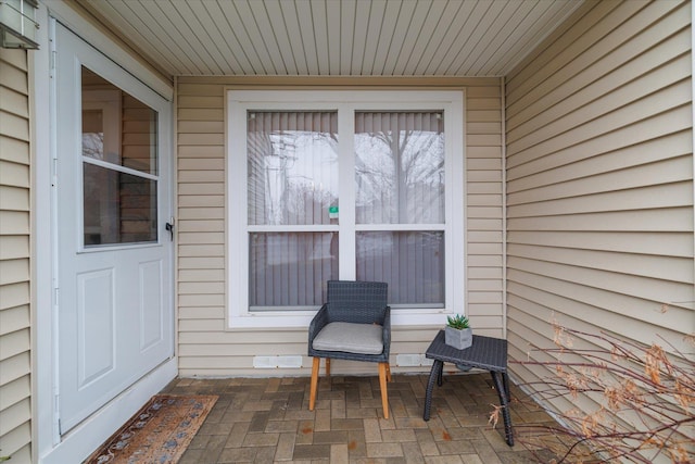 property entrance with a patio area