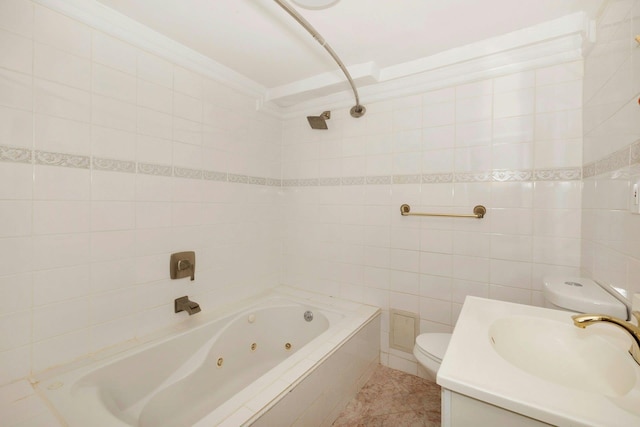 full bathroom with tile patterned flooring, tile walls, toilet, and vanity