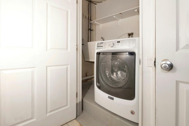 laundry room with washer / clothes dryer