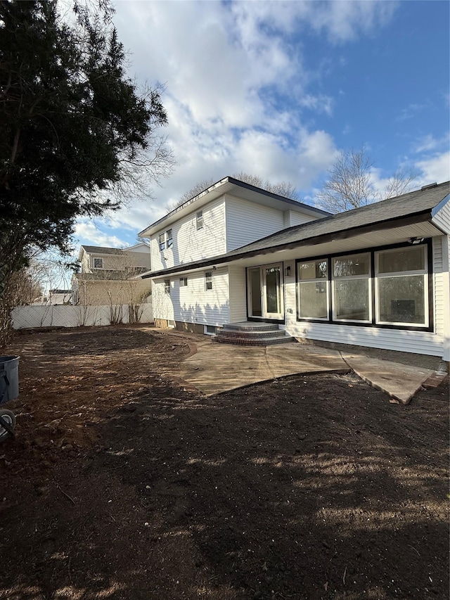 back of property with a patio area