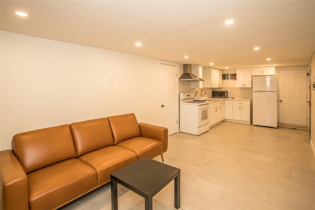 living area with recessed lighting