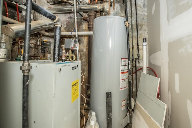 utility room featuring gas water heater