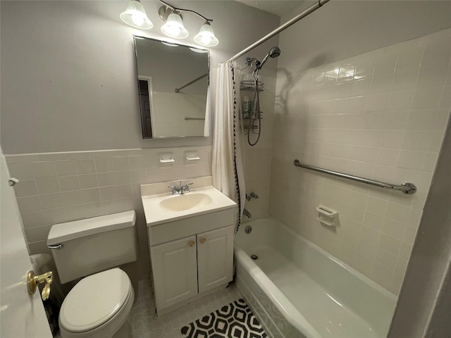 full bathroom featuring tile walls, tile patterned flooring, vanity, toilet, and shower / bathtub combination with curtain