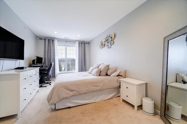 bedroom featuring recessed lighting and light colored carpet