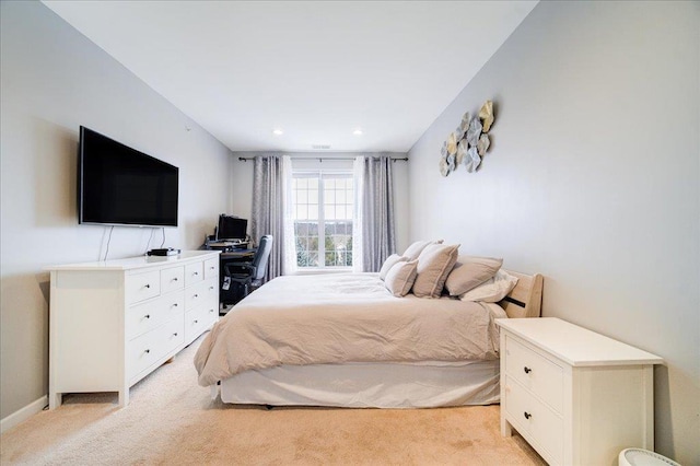 bedroom with light carpet, baseboards, and recessed lighting