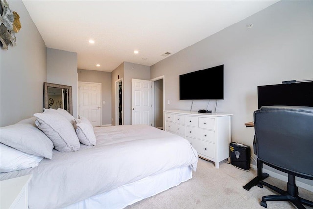 bedroom featuring recessed lighting, visible vents, and light colored carpet