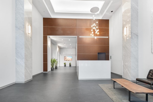 reception area with a notable chandelier