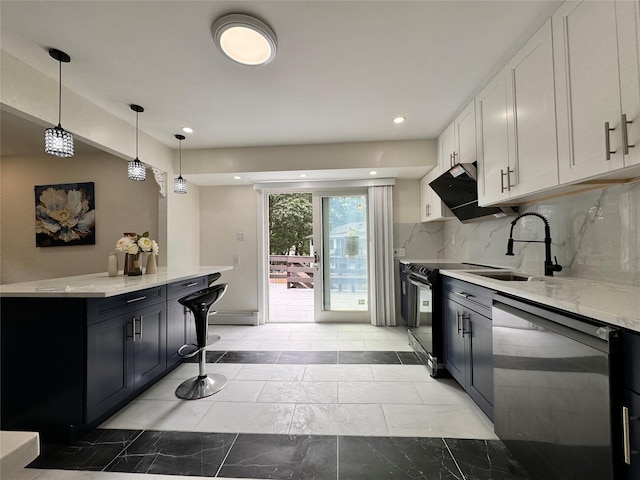 kitchen with sink, black appliances, decorative light fixtures, white cabinets, and backsplash