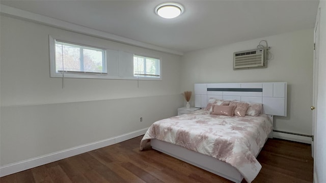 bedroom featuring baseboard heating, a wall mounted air conditioner, and dark hardwood / wood-style flooring