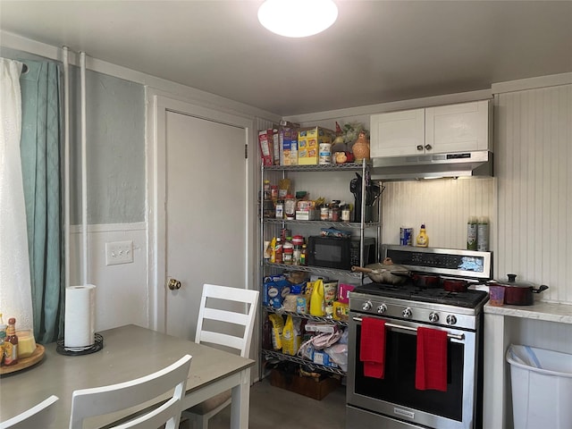 kitchen with white cabinetry and stainless steel range with gas stovetop