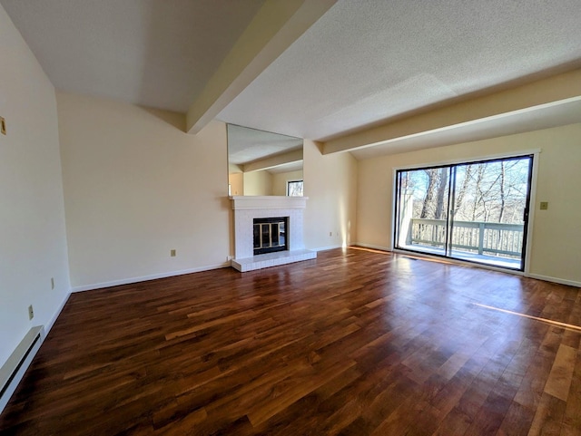 unfurnished living room featuring a textured ceiling, dark hardwood / wood-style floors, beamed ceiling, and baseboard heating