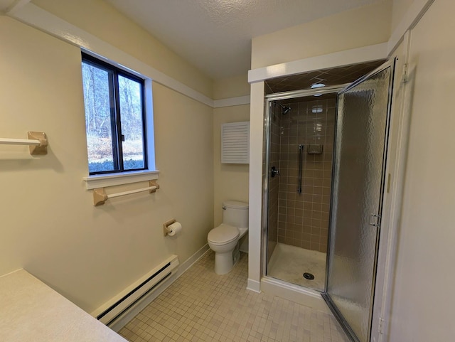 bathroom featuring a baseboard radiator, tile patterned floors, toilet, and a shower with door