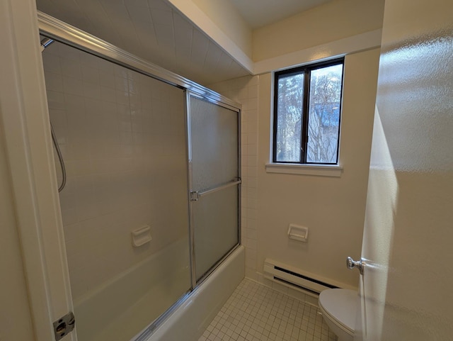 bathroom featuring enclosed tub / shower combo, a baseboard heating unit, tile patterned floors, and toilet