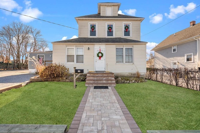 front of property with a front lawn