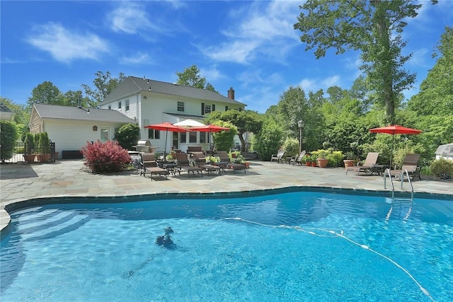 pool featuring a patio