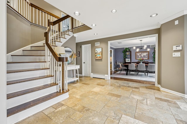 entryway featuring stone tile floors, recessed lighting, visible vents, a baseboard heating unit, and baseboards