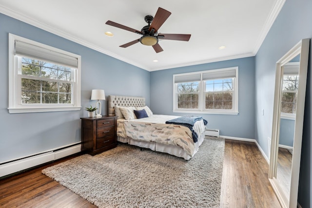 bedroom with multiple windows, crown molding, and baseboards