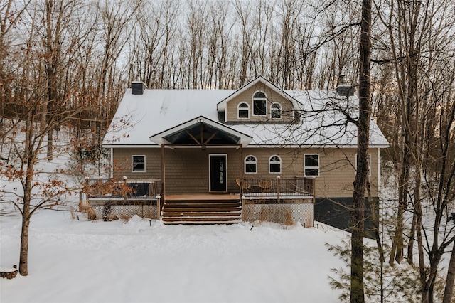 view of snow covered house