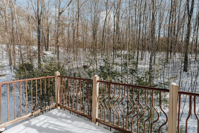 view of snow covered deck