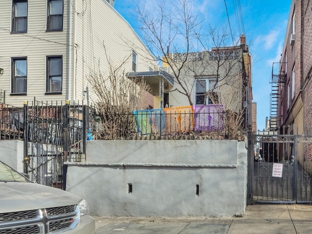 view of side of property with a fenced front yard