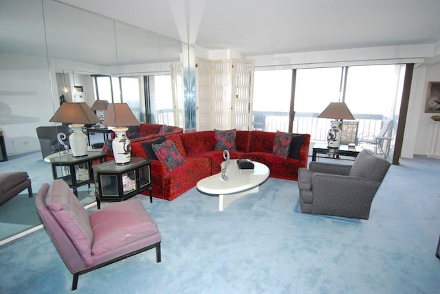 living room featuring plenty of natural light and carpet floors