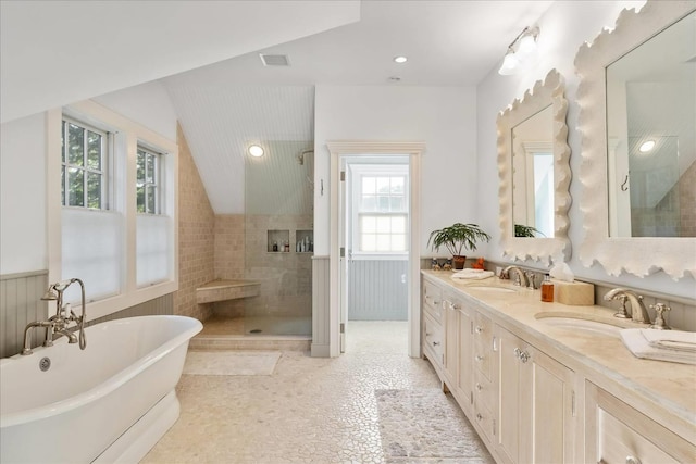 bathroom featuring independent shower and bath and vanity