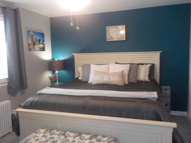 bedroom featuring radiator heating unit