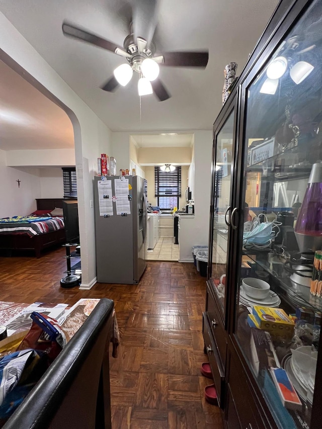 hallway featuring dark parquet floors