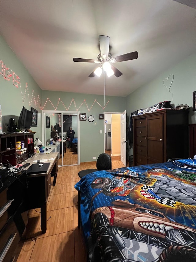 bedroom featuring ceiling fan and light wood-type flooring