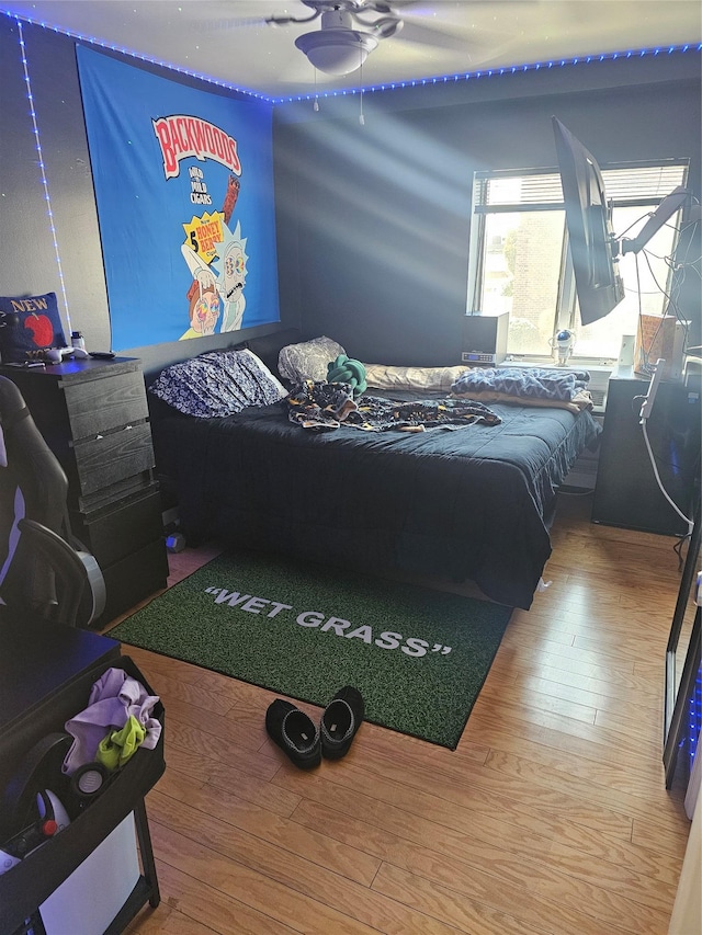 bedroom featuring wood-type flooring