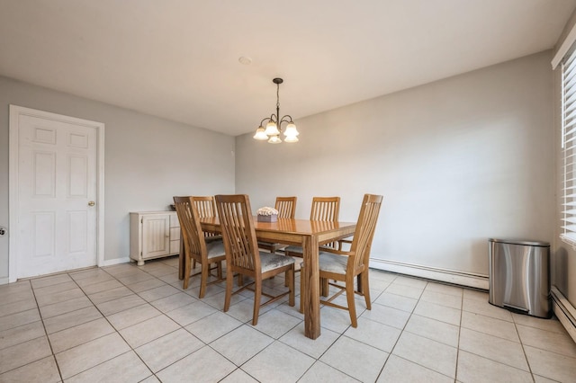 tiled dining space with an inviting chandelier and baseboard heating