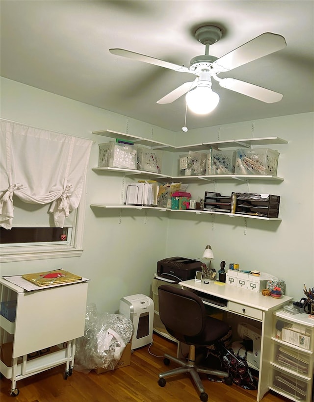 office with ceiling fan and dark hardwood / wood-style flooring