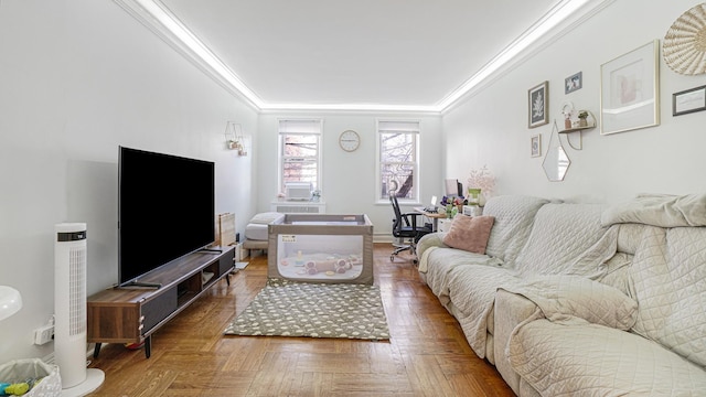 living room featuring ornamental molding and parquet flooring