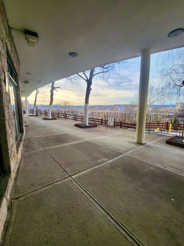 view of patio terrace at dusk