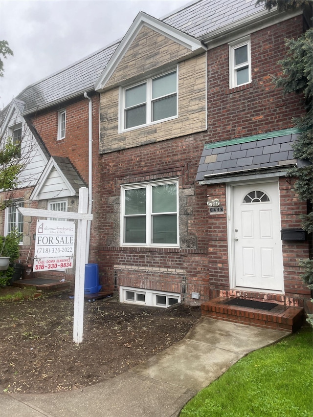 64-18 84th Pl, Middle Village, NY 11379 - multi unit property featuring a high end roof, brick siding, and cooling unit