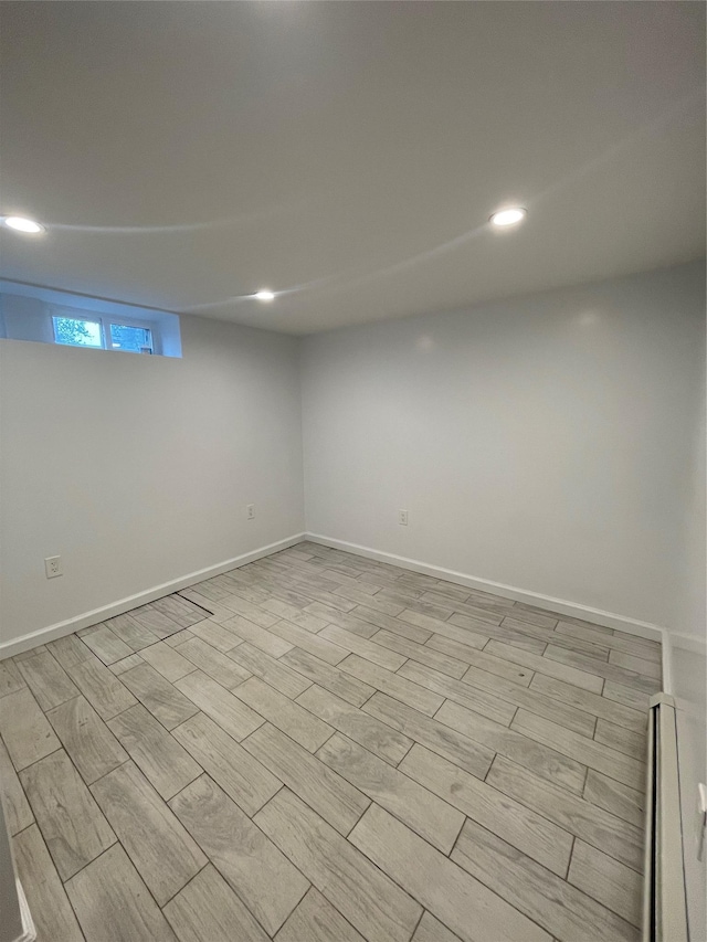 64-18 84th Pl, Middle Village, NY 11379 - basement with recessed lighting and baseboards