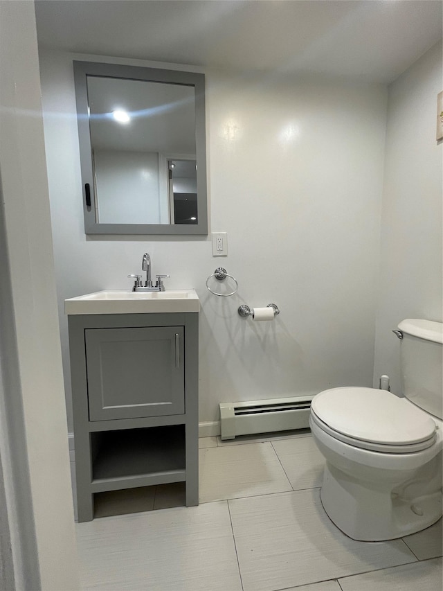 64-18 84th Pl, Middle Village, NY 11379 - bathroom featuring a baseboard radiator, toilet, tile patterned floors, and vanity